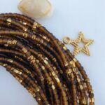 WAIST BEADS IN WARM TONES OF BROWN AND GOLD HAND MADE IN GHANA