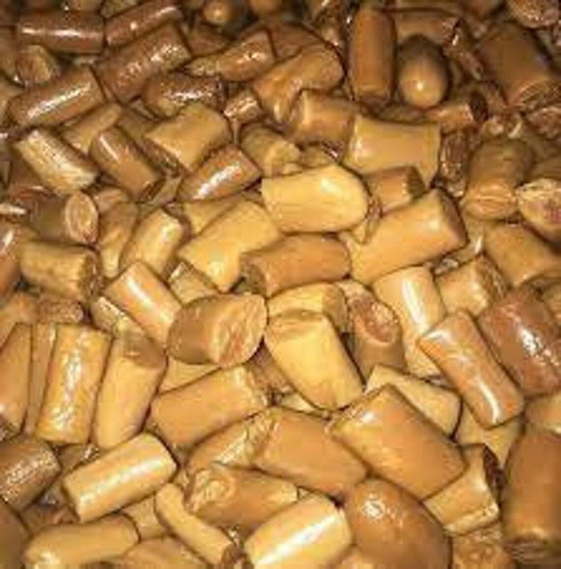 50 PIECES OF GHANA KUBE TOFFEE/NIGERIAN BABA DUDU/COCONUT CANDY (WHOLESALE AVAILABLE) (NANLBS)